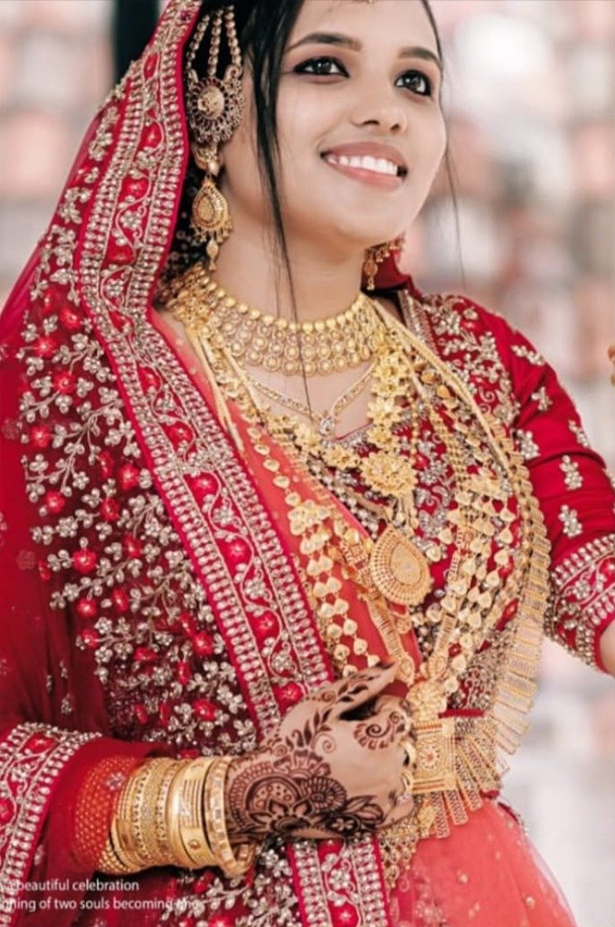 Red Embroidered Veil Bride on the Varnam Instagram feed